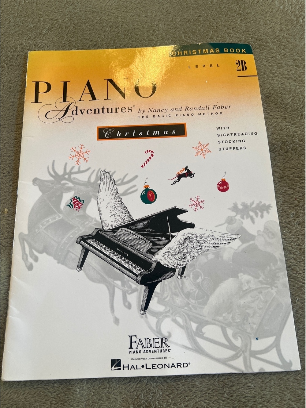 Piano Adventures Christmas Book Level 2B by Nancy and Randall Faber - Basic Xmas